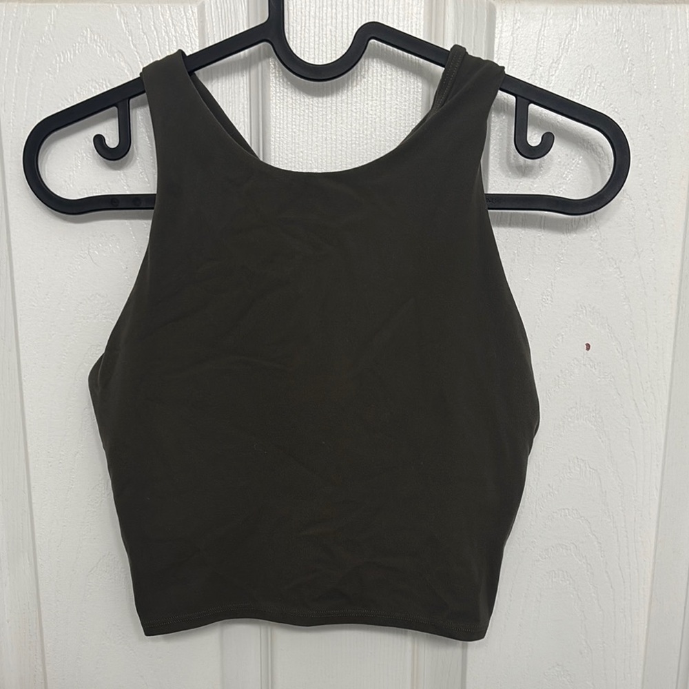 Gray sleeveless crop tank top with crew neck and fitted style